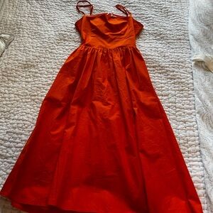 Open back orange dress